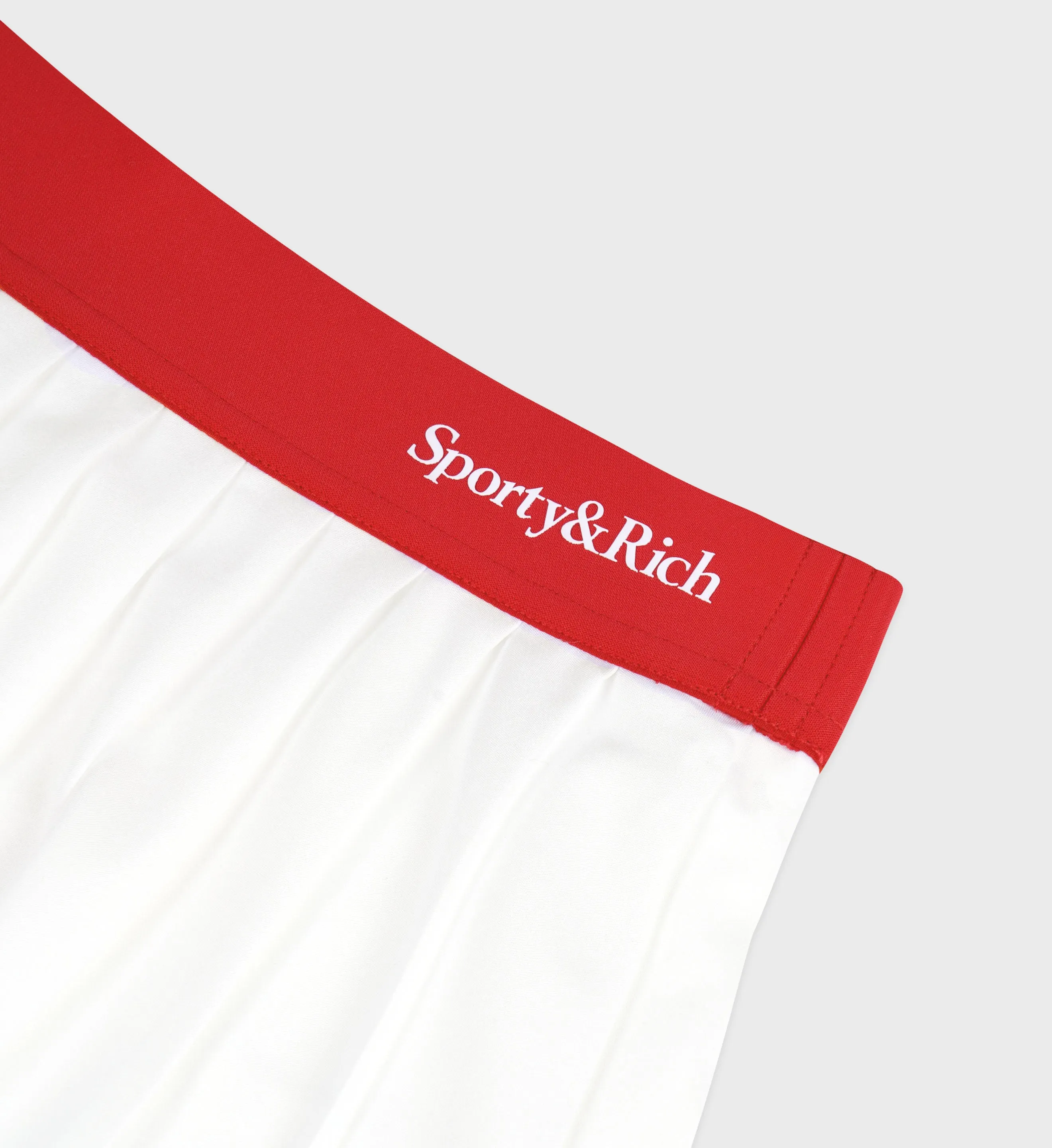 Serif Logo Pleated Skirt - White/Sports Red